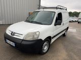 a picture of a white van parked in a parking lot