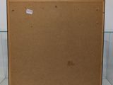 a cardboard box with a piece of paper on top of it