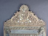 a mirror that is sitting on the wall
