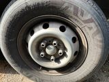 a close up of a tire on a vehicle