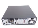 the back view of a computer with a hard drive on top of it