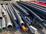 a lot of pipes that are laying out on the ground
