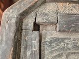 a close up of a piece of wood with a hole in it