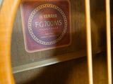 a close up of a guitar with a label on it
