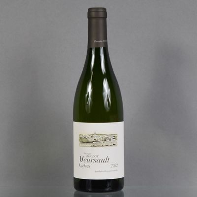 a bottle of wine that is sitting on a table