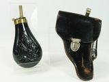 pair of antique black leather holsters with brass fittings
