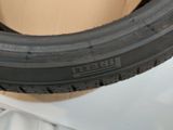 a close up of a bicycle tire on a shelf