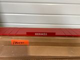 the box is full of boxes and a sign that says hermes