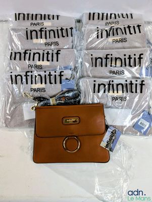 four bags of luggage sitting on a table next to each other