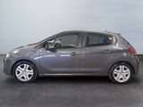 the grey car is parked in the garage on the concrete floor