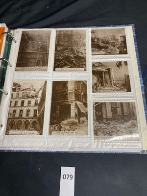 an old photo of a book with pictures of buildings on it