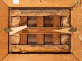 a picture of a wooden box with a wooden handle