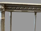 a fireplace mantle with a clock on top of it