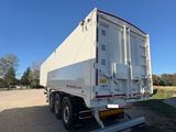 an image of a white semi truck parked in a lot