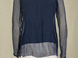 an image of a mannequin mannequin with a blue shirt on it
