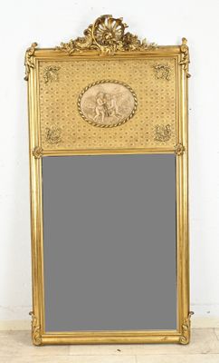 an image of a gold framed mirror with a picture of an elephant on it