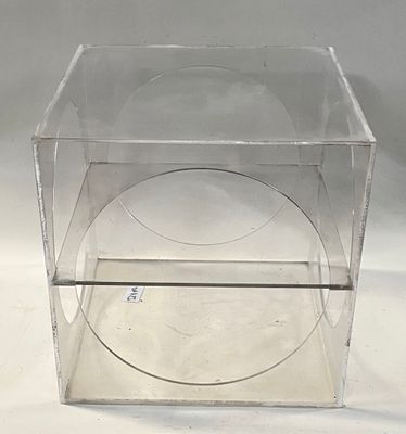 a clear box with a clear lid on a white surface