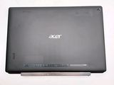 the back view of a laptop with a small screen on it