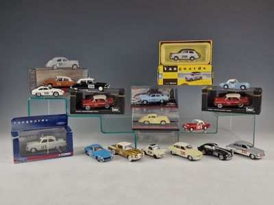 a lot of toy cars on display in a display case
