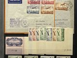 a picture of a collection of stamps on display in a glass case