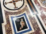a marble table with pictures on it in a room