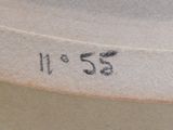 a picture of a close up of a hat with the number 555 on it