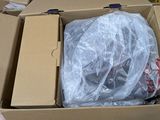 a cardboard box with a bunch of items inside of it