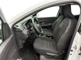 the interior of a car with the door open and the driver ' s seat up