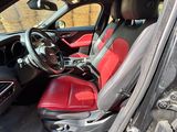 a picture of the inside of a car with the door open