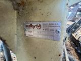 a label on the side of a machine that is sitting on the ground
