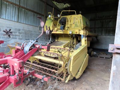 a large yellow machine that is sitting in a building