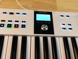 a close up of an electronic keyboard on a table