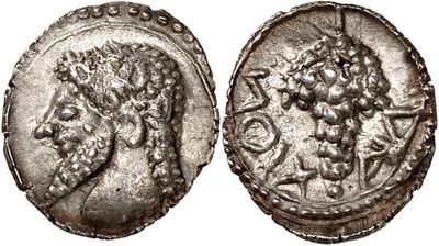 a silver coin with an image of a man on it