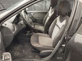 a picture of the inside of a car with the door open