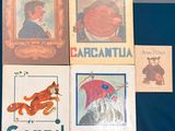 four vintage children ' s books are on a blue surface