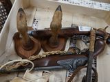 a wooden box with a bunch of different items in it