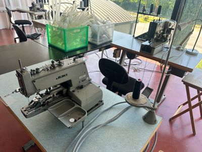 a sewing machine sitting on a table in a room