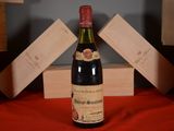 a bottle of wine that is sitting on a table