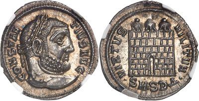 a silver coin with a bust of a man on it