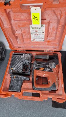 an orange tool case with tools in it on the floor
