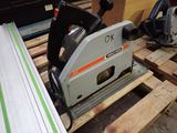 a picture of a circular blade sander on a pallet