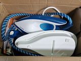 a cardboard box with a pair of shoes inside of it