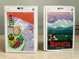 two boxes with pictures of food on them sitting on a table