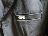 a close up of a jacket with a logo on it