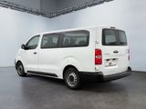 a white van that is parked inside of a building