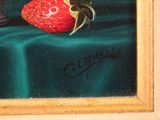 a picture of a painting of a strawberry on a table
