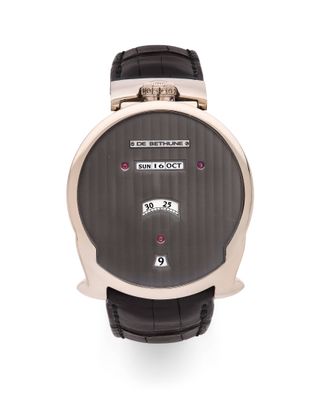 une image d'un gros plan d'une montre-bracelet sur un fond blanc