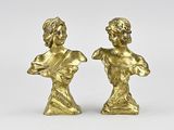 pair of antique brass figurines of a woman and a man