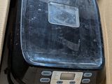 a box with a microwave inside of it on a table
