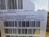 un gros plan sur un code-barres figurant sur un ticket de caisse